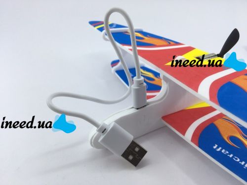 The Airkraft propellant foam airplane glider with a rechargeable electric motor is charged from microUSB