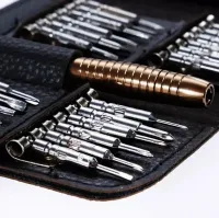 A set of screwdrivers with magnetic bits 25 in 1 set of tools for repairing and disassembling phones electronics mini screwdrivers for a radio master in a case
