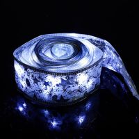 LED garland in the form of a ribbon LaceShine cold white 5 meters with a pattern of snowflakes on batteries, tape 5m 50 LED diodes Cold white
