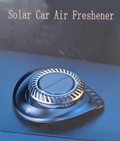 Car fragrance Solar Car Air Freshener solar powered diffuser and license plate on the dashboard of the car True Paradise